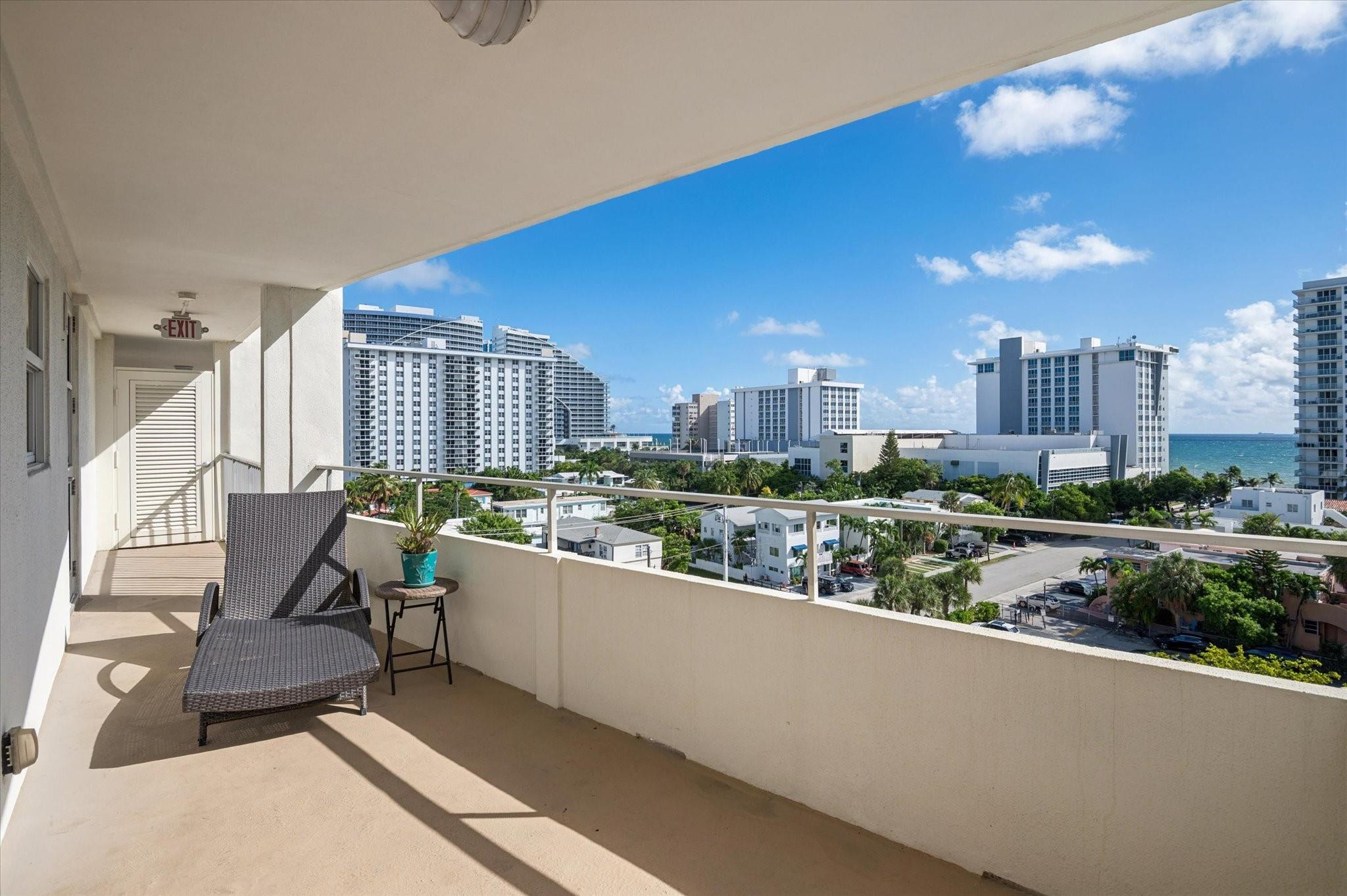 215 North Birch Road, Unit 8C Fort Lauderdale, FL 33304 - Photo 17 of 22 a view of a living room and kitchen