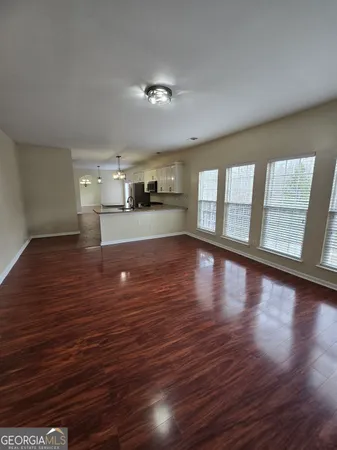 a kitchen with stainless steel appliances double vanity sink and stove