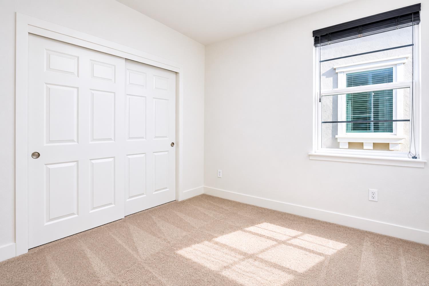 1837 South La Barbera Avenue Mountain House, CA 95391 - Photo 30 of 54 an empty room with a window