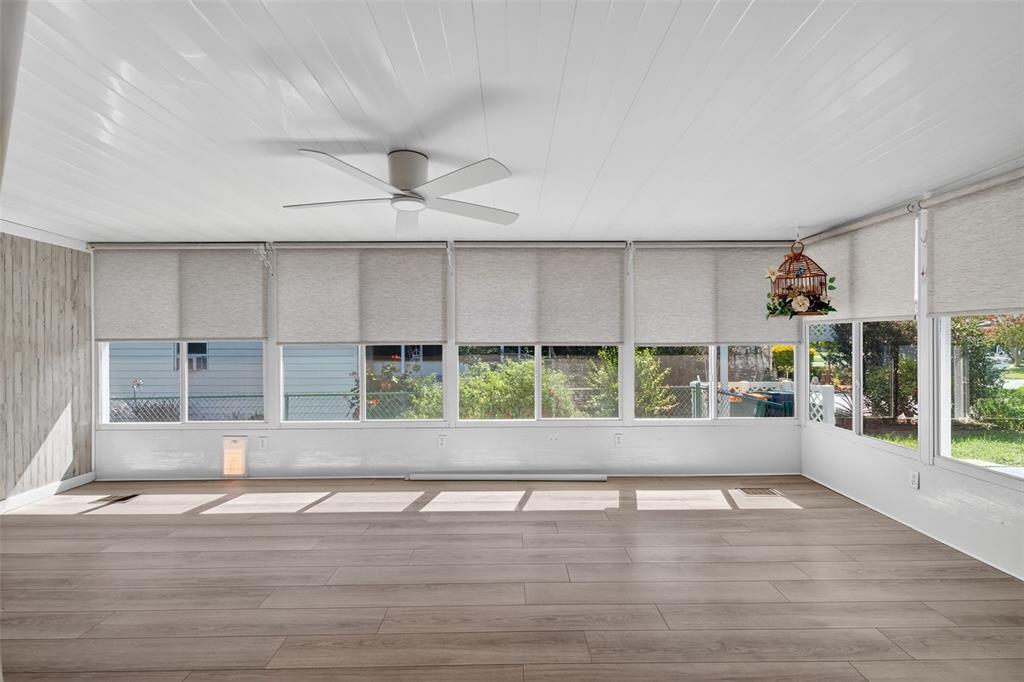 3024 Manatee Road Tavares, FL 32778 - Photo 14 of 39 a view of entryway and hall with wooden floor