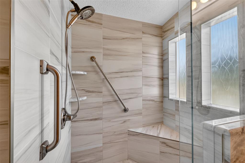 3024 Manatee Road Tavares, FL 32778 - Photo 19 of 39 a bathroom with a shower