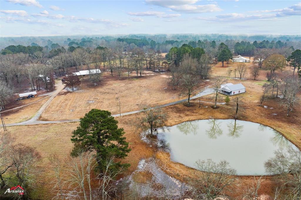 2912 Jamerson Road Haughton, LA 71037 - Photo 4 of 37 a view of a swimming pool with a yard