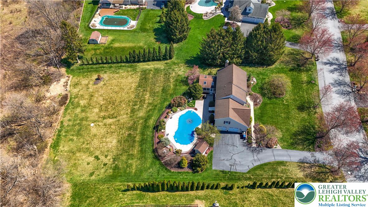 4059 Old Sentry Road Allentown, PA 18104 - Photo 38 of 39 An aerial perspective reveals a spacious estate with a private pool and extensive landscaped grounds.
