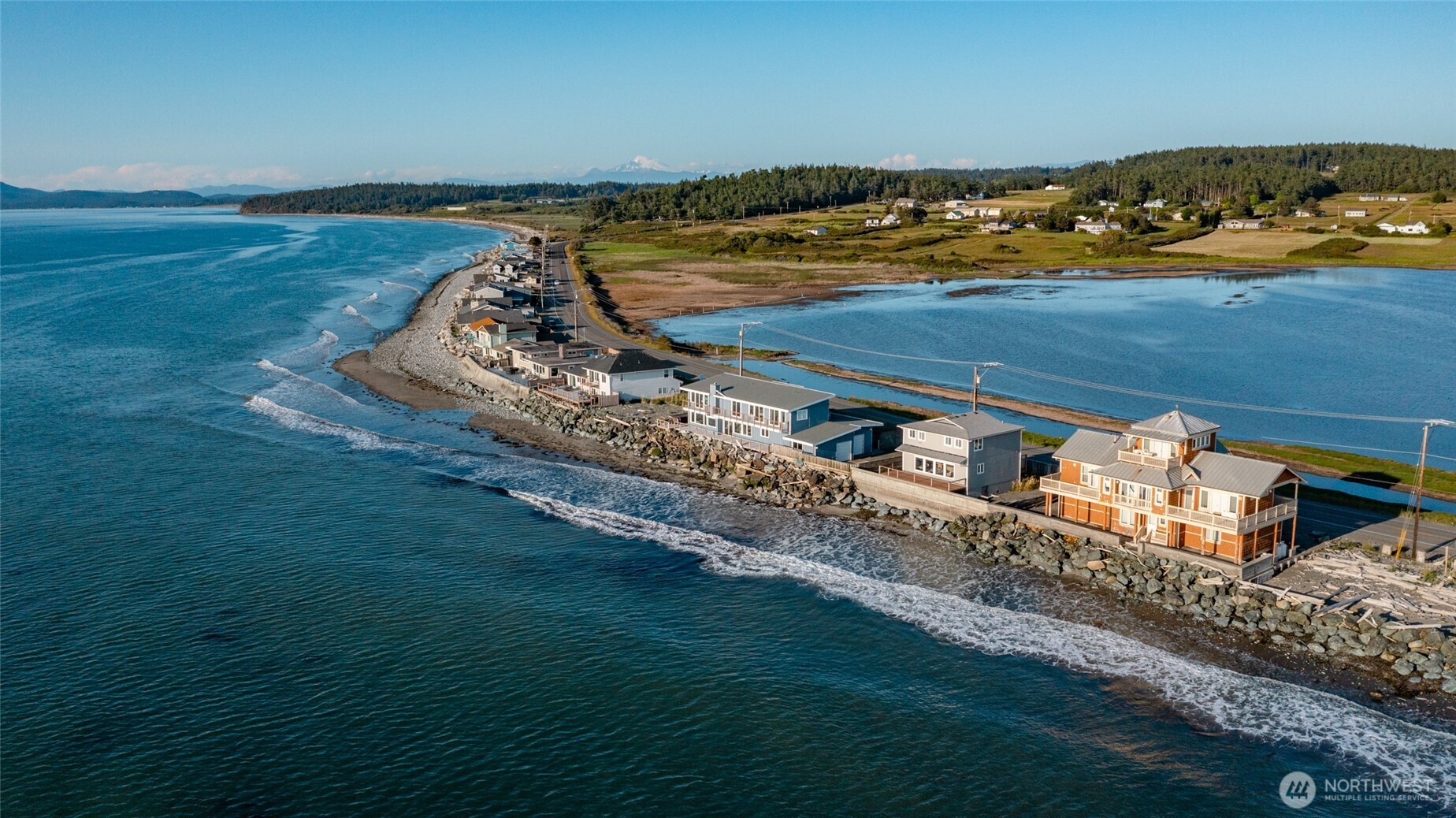 a view of a balcony with an ocean