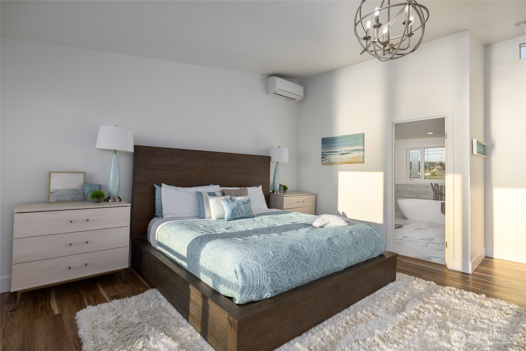 2575 West Beach Road Oak Harbor, WA 98277 - Photo 27 of 40 a bedroom with a bed and window