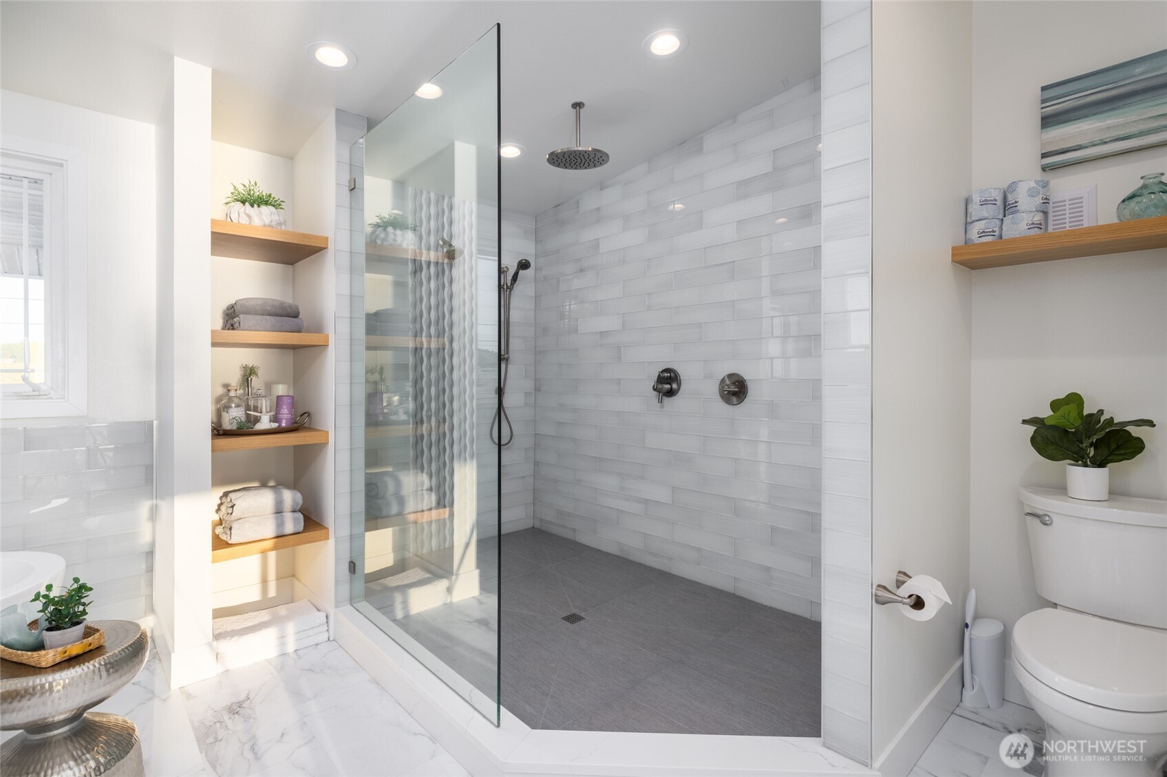 2575 West Beach Road Oak Harbor, WA 98277 - Photo 29 of 40 a bathroom with a shower and a toilet