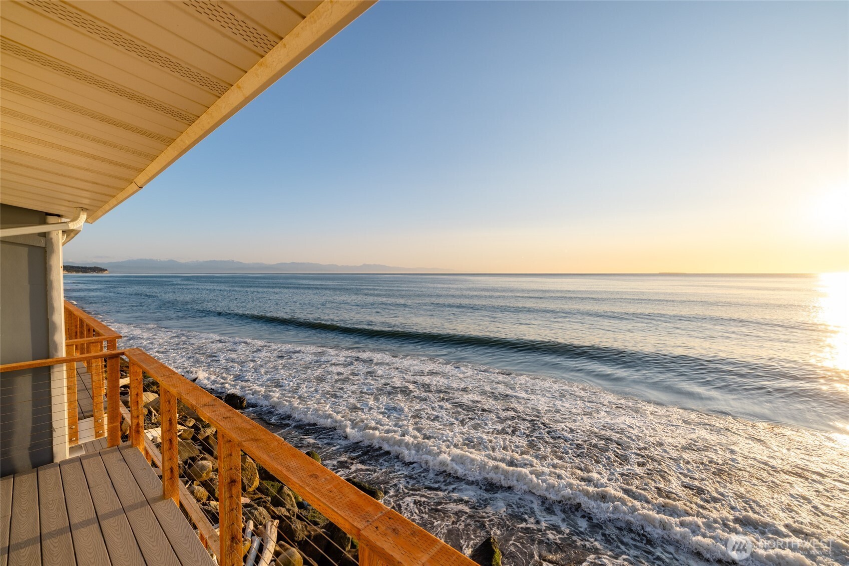2575 West Beach Road Oak Harbor, WA 98277 - Photo 8 of 40 a view of an ocean from a balcony