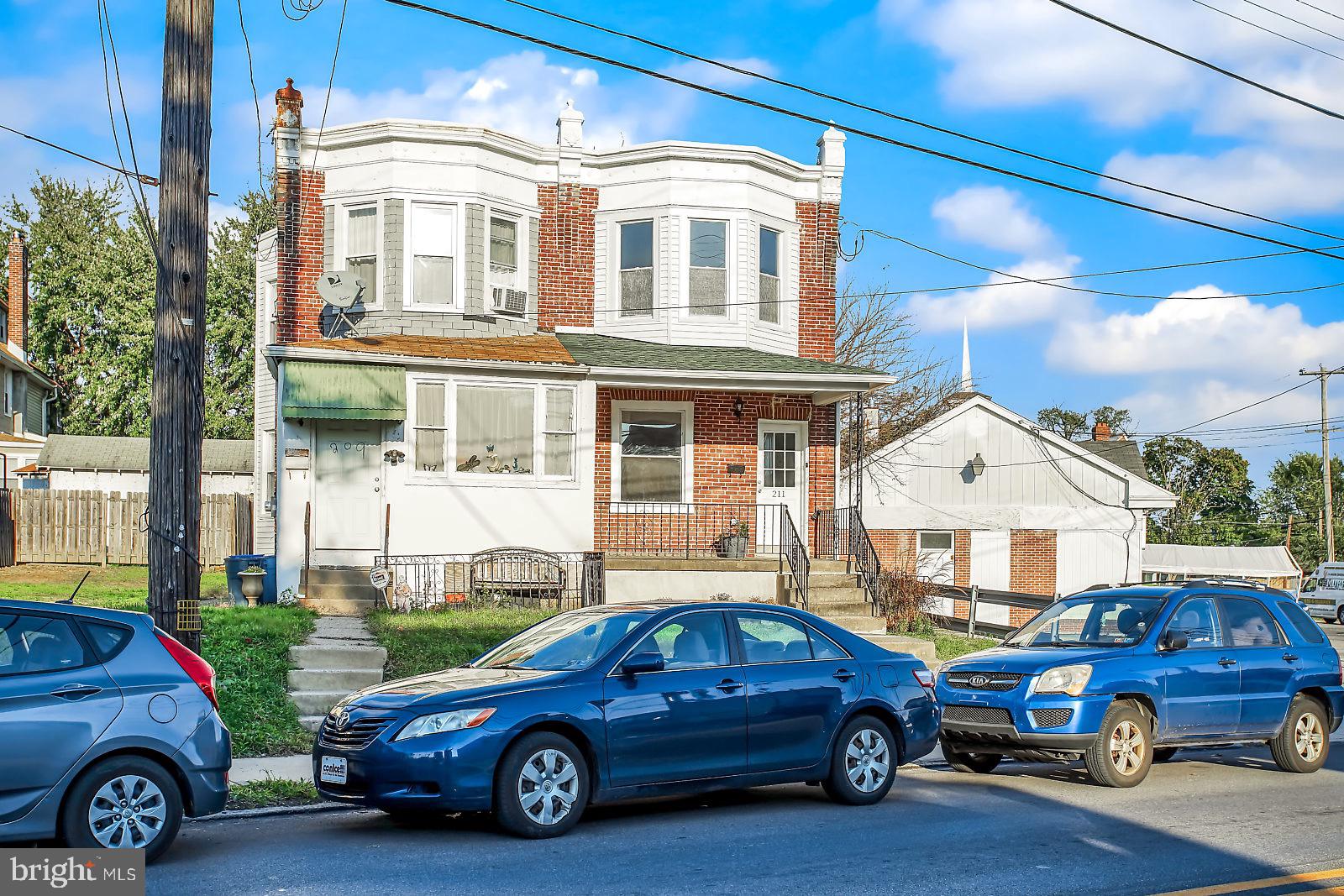 211 South Springfield Road Clifton Heights, PA 19018 - Photo 2 of 24 a car parked in front of a house