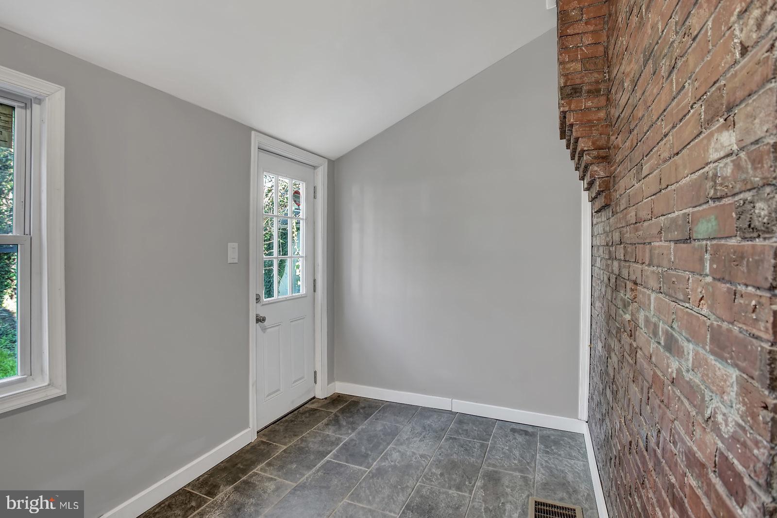211 South Springfield Road Clifton Heights, PA 19018 - Photo 14 of 24 a view of an empty room with a window