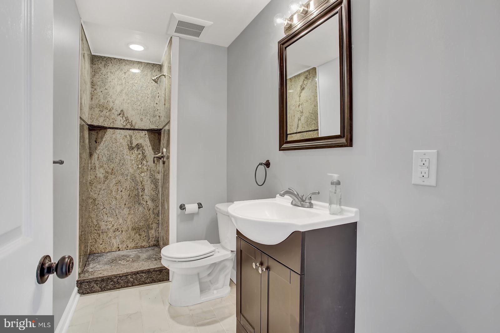 211 South Springfield Road Clifton Heights, PA 19018 - Photo 15 of 24 a bathroom with a sink toilet and shower