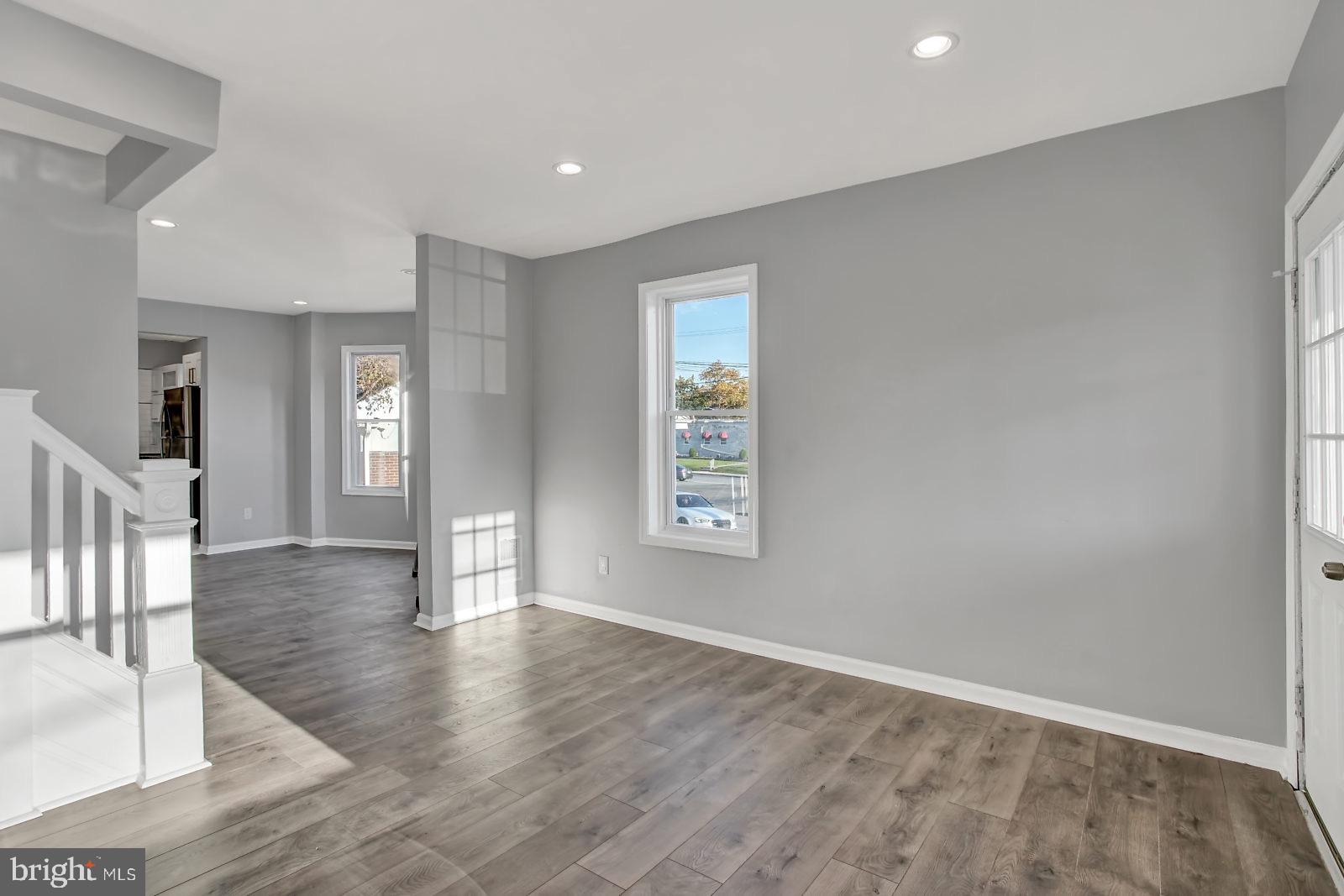 211 South Springfield Road Clifton Heights, PA 19018 - Photo 4 of 24 wooden floor in an empty room with a window