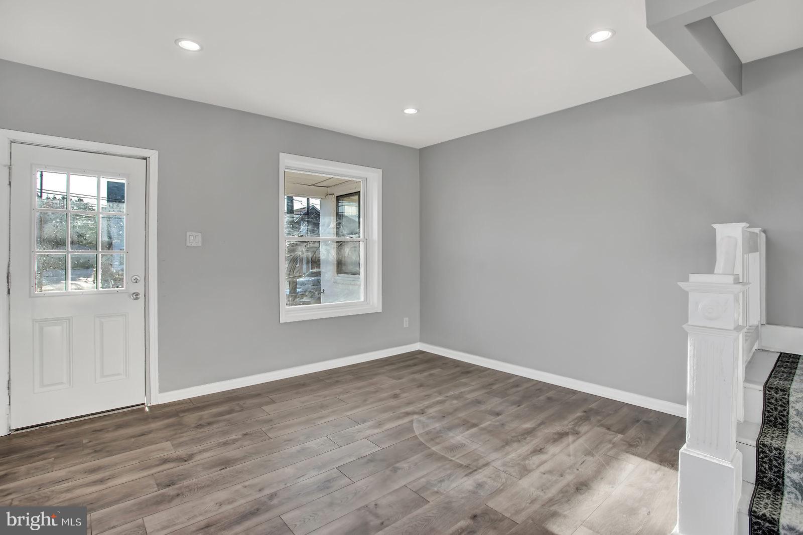 211 South Springfield Road Clifton Heights, PA 19018 - Photo 6 of 24 a view of empty room with wooden floor and fan
