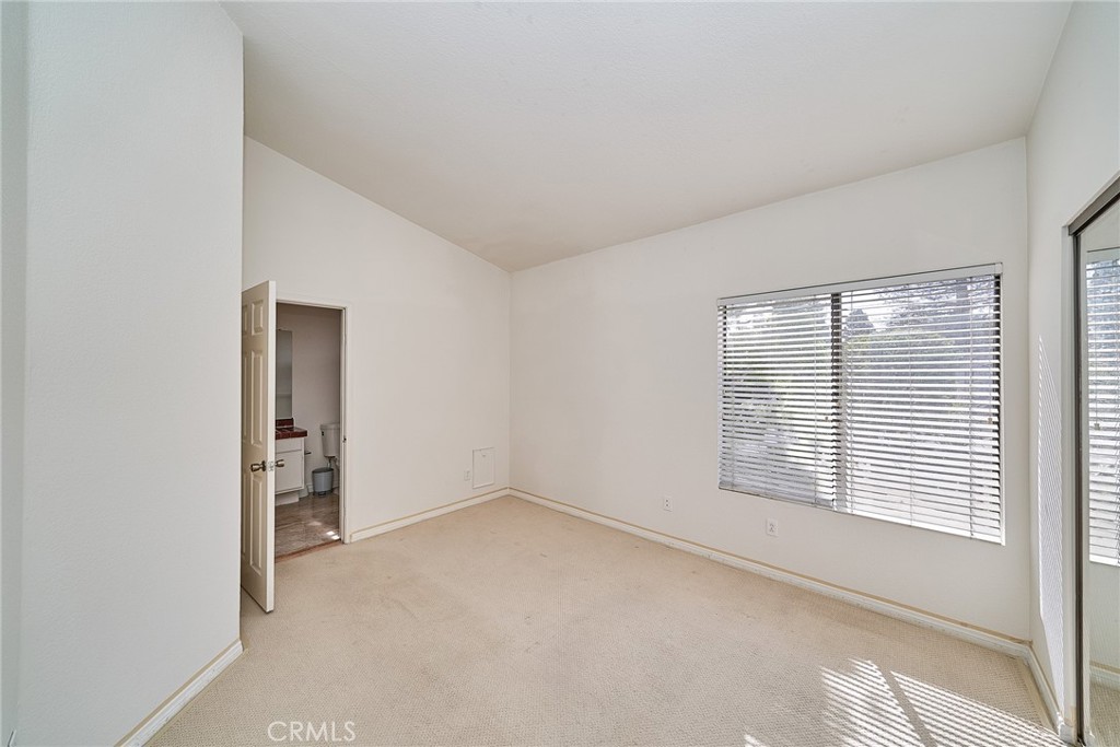 4431 Emerald Street Torrance, CA 90503 - Photo 19 of 31 a view of an empty room with a window