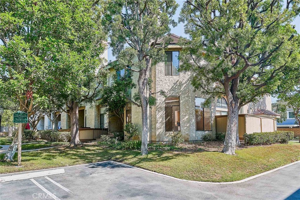 4431 Emerald Street Torrance, CA 90503 - Photo 2 of 31 front view of house with a garden