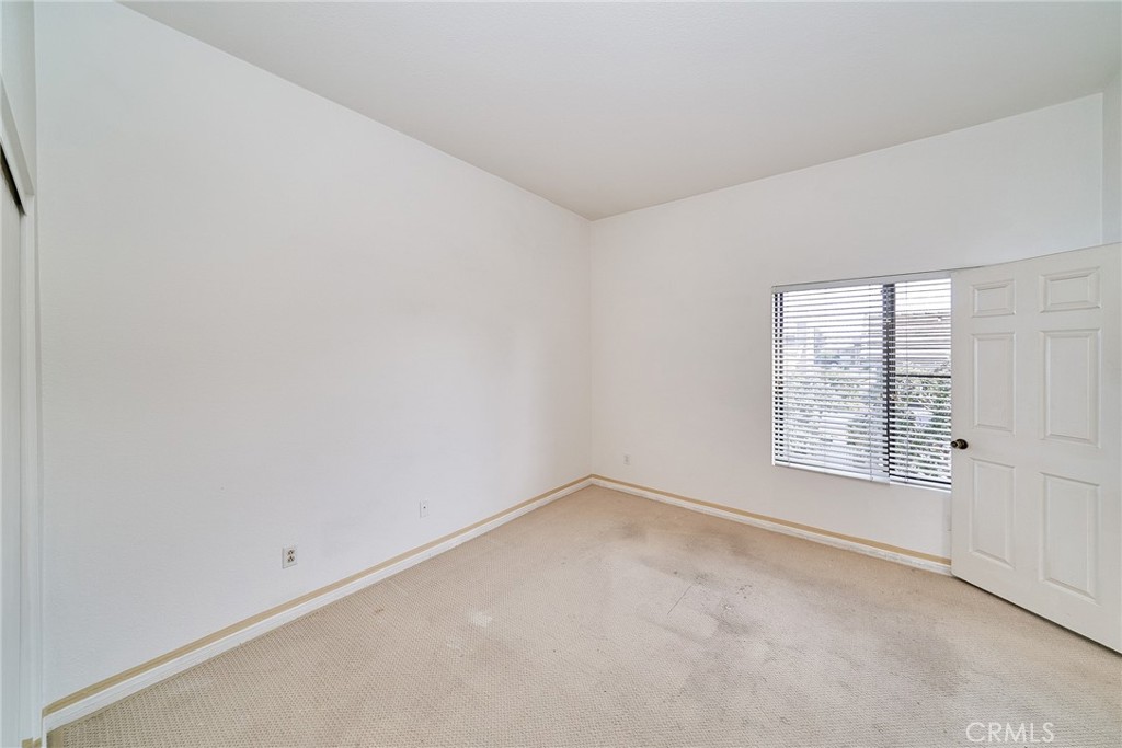 4431 Emerald Street Torrance, CA 90503 - Photo 23 of 31 an empty room with a window