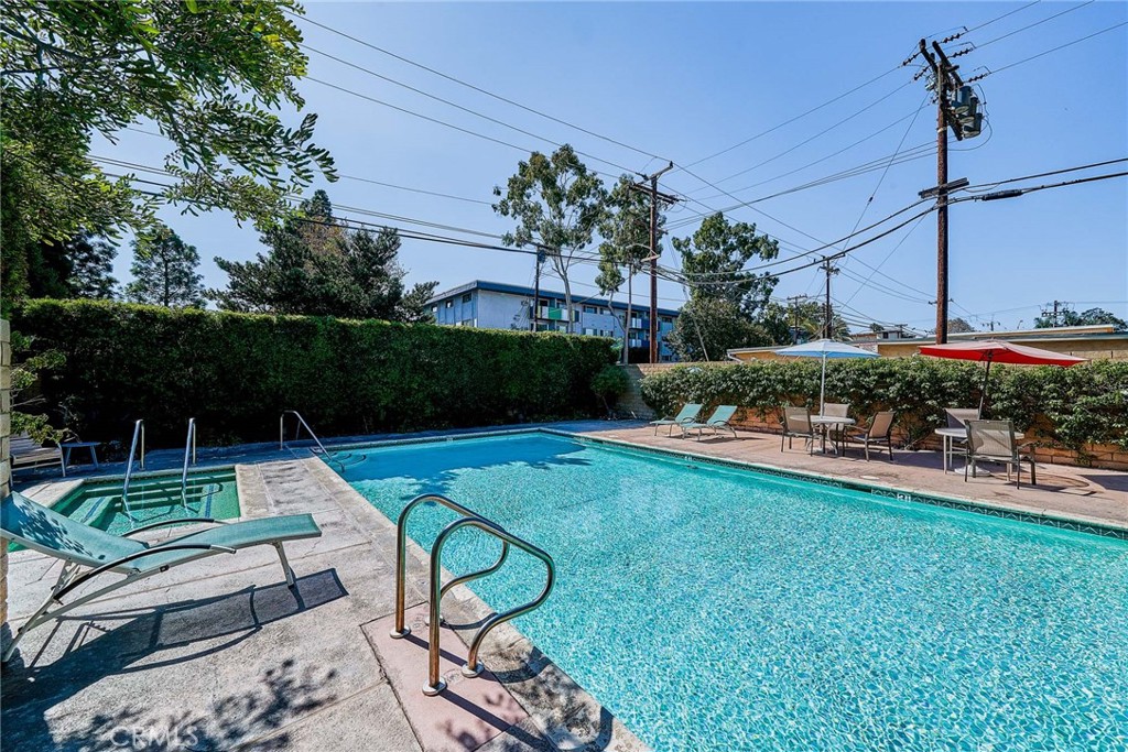 4431 Emerald Street Torrance, CA 90503 - Photo 28 of 31 a view of a chair and table in backyard of the house