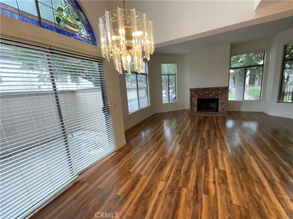 4431 Emerald Street Torrance, CA 90503 - Photo 3 of 31 a view of livingroom with kitchen and fireplace