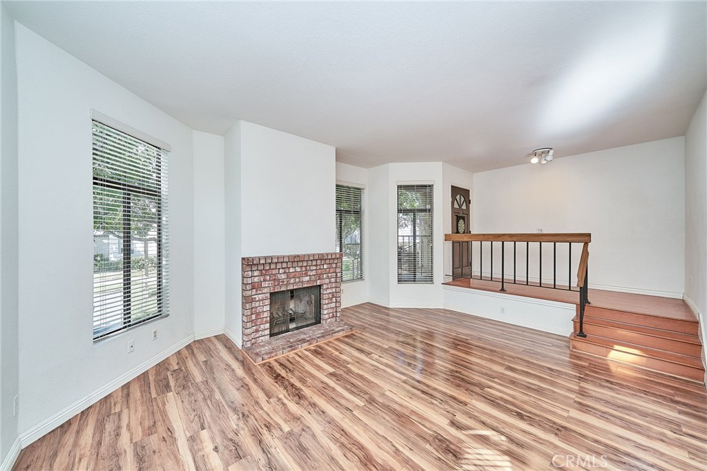 4431 Emerald Street Torrance, CA 90503 - Photo 6 of 31 a view of livingroom with furniture and fireplace