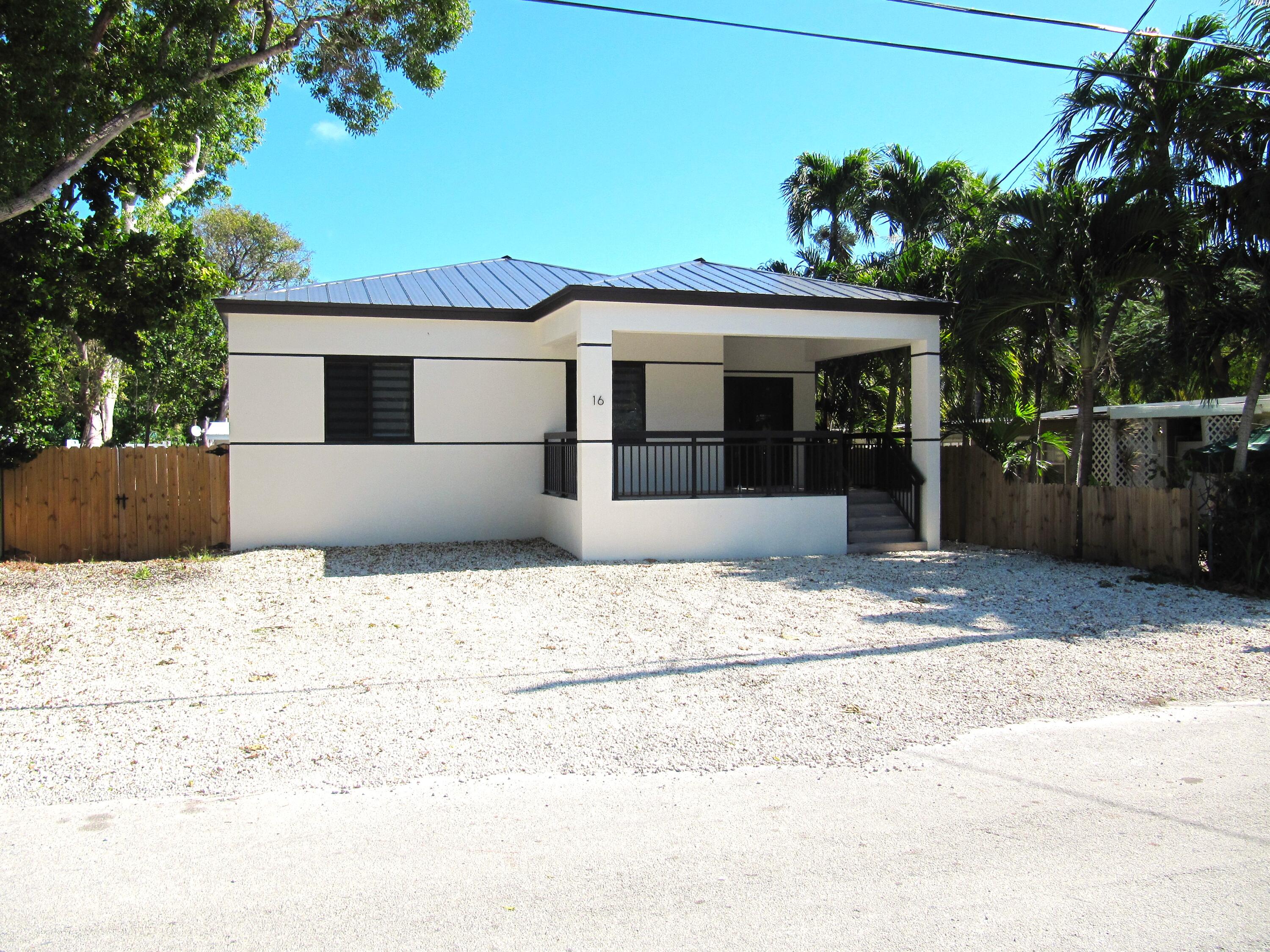 16 Tina Place Key Largo, FL 33037 - Photo 19 of 19 a front view of a house with a yard