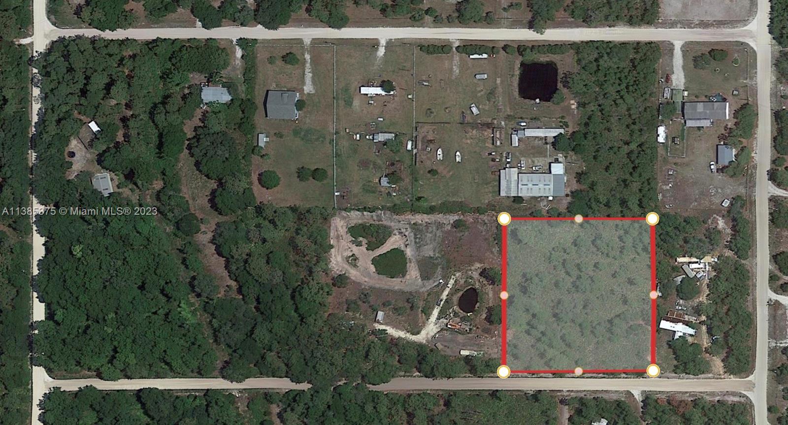 521 Gurney Road Venus, FL 33960 - Photo 2 of 3 a view of outdoor space and city view