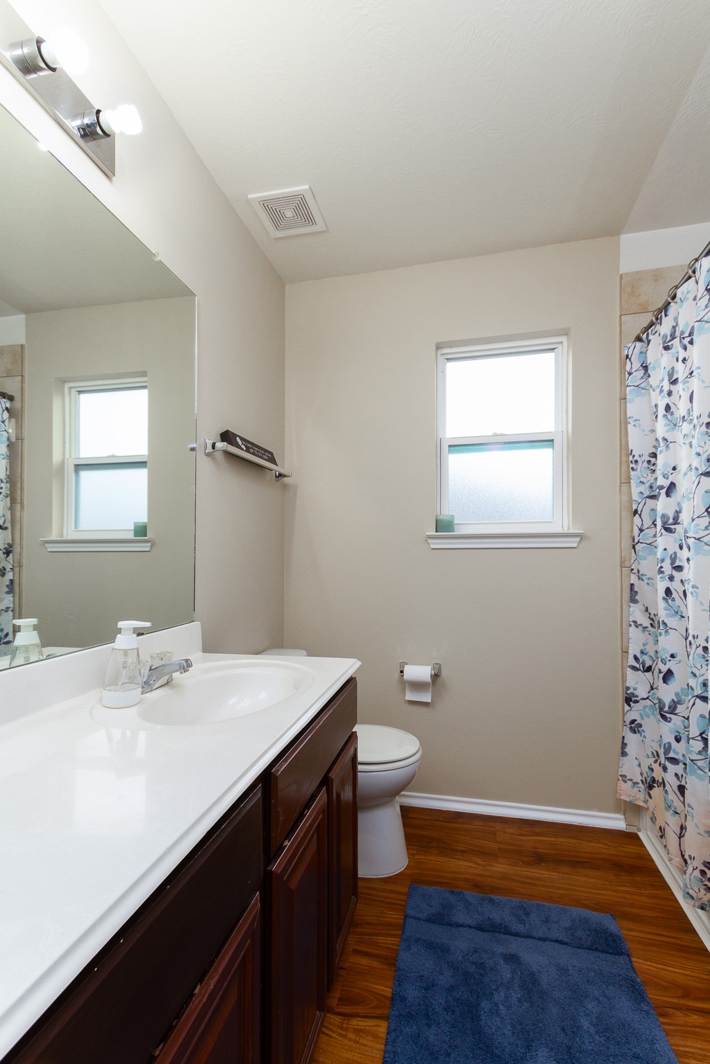 1107 Arum Road Missouri City, TX 77489 - Photo 19 of 23 The 2nd bathroom with recent laminate floors offers a large vanity with ample counter space and a nice tub/shower