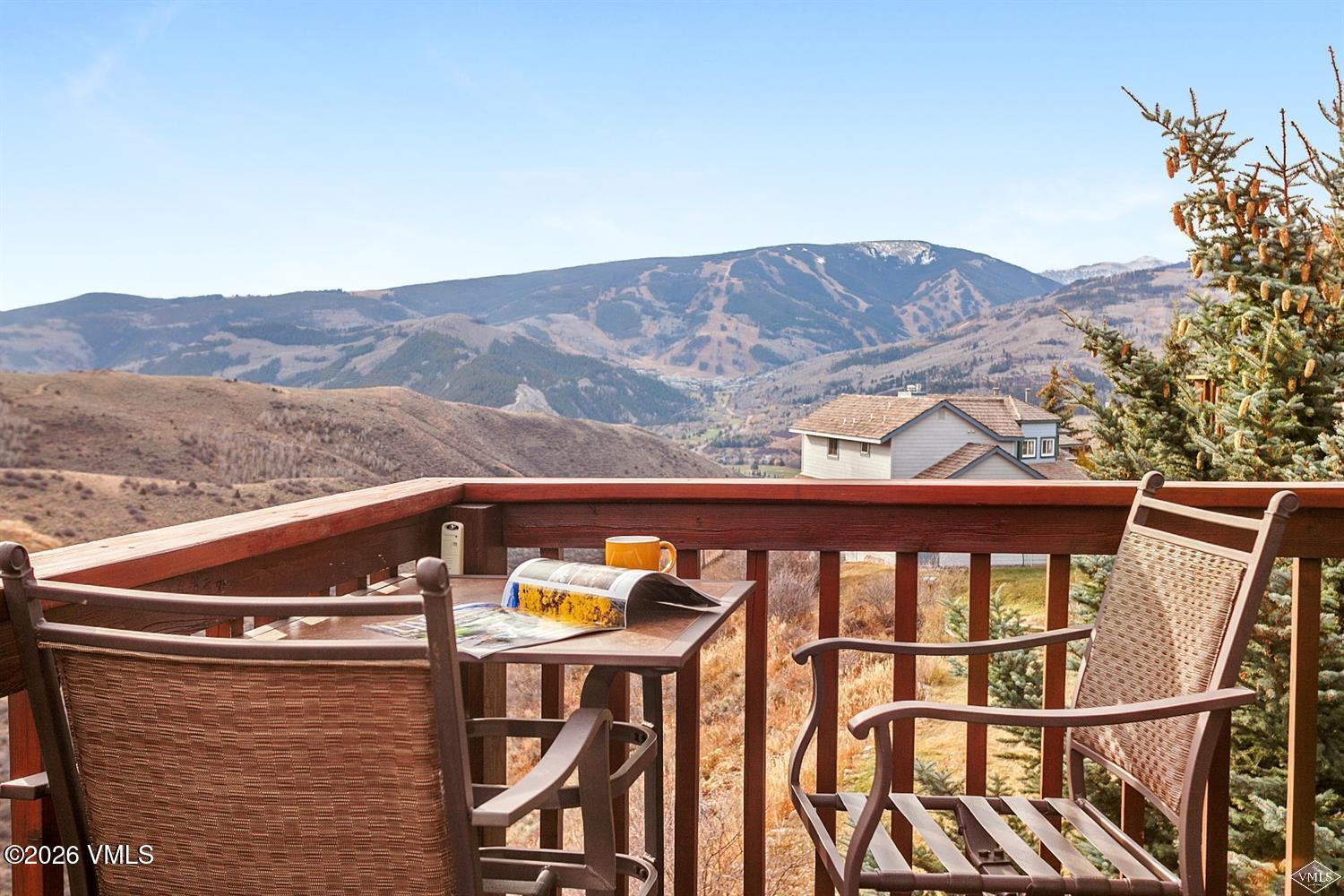 3008 West Wildridge Road, Unit A4 Avon, CO 81620 - Photo 1 of 1 a view of a balcony with furniture and a mountain