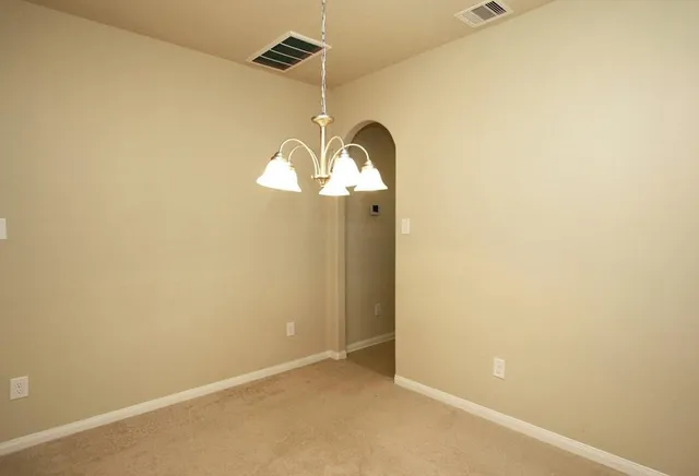 a kitchen with a sink stove and refrigerator