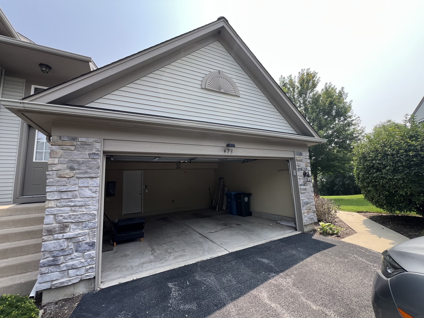 473 Metropolitan Street, Unit 473 Aurora, IL 60502 - Photo 2 of 8 a view of a house with a patio