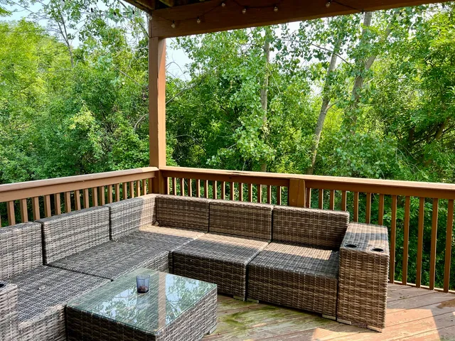 a view of a two chairs in the deck