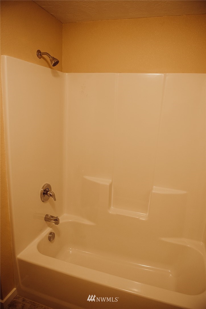 116 Eadon Road Toledo, WA 98591 - Photo 12 of 34 a bathroom with a shower