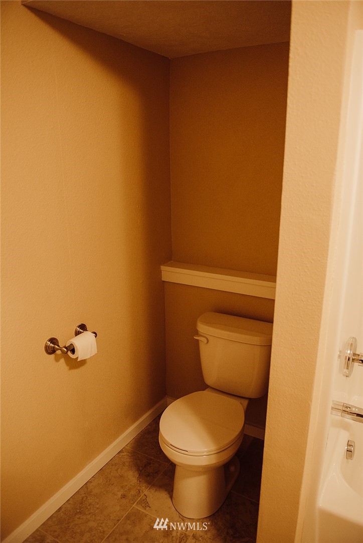116 Eadon Road Toledo, WA 98591 - Photo 14 of 34 a toilet sitting in a bathroom next to a sink