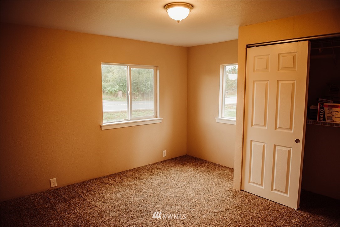 116 Eadon Road Toledo, WA 98591 - Photo 18 of 34 an empty room with windows and closet