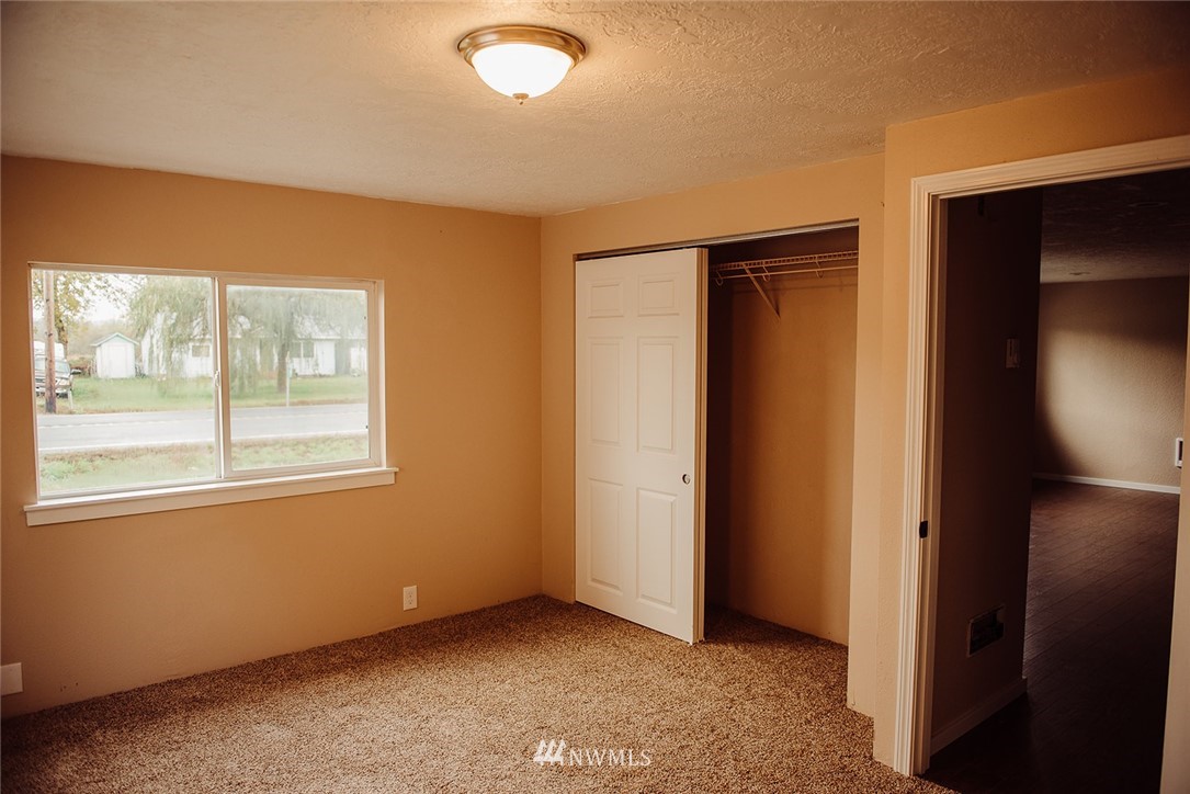 116 Eadon Road Toledo, WA 98591 - Photo 21 of 34 an empty room with windows and closet