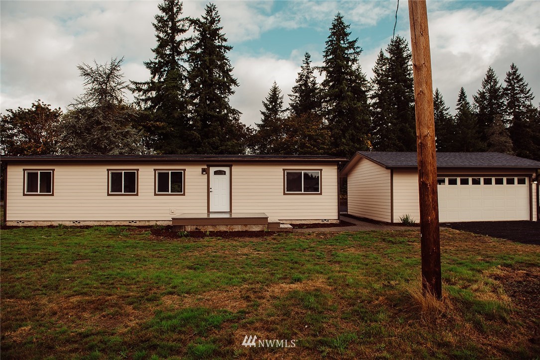 116 Eadon Road Toledo, WA 98591 - Photo 27 of 34 a house with trees in the background