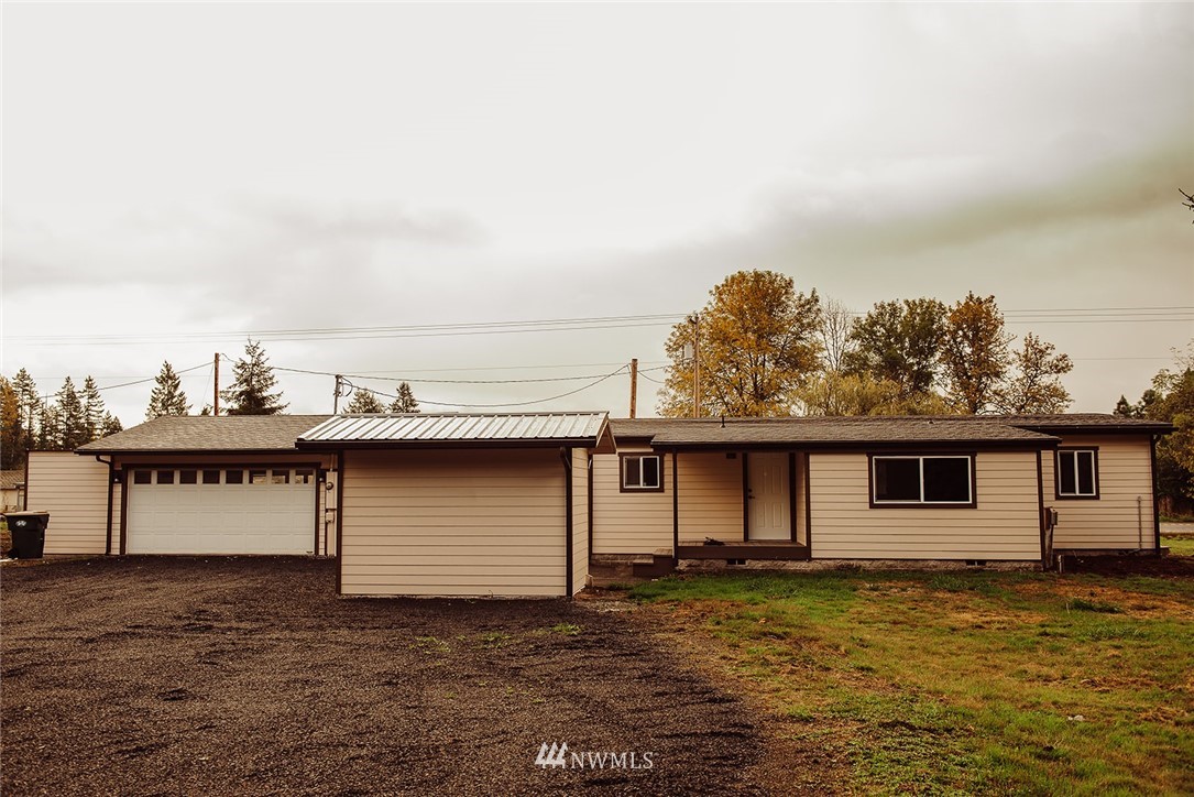 116 Eadon Road Toledo, WA 98591 - Photo 30 of 34 a view of a house with a backyard