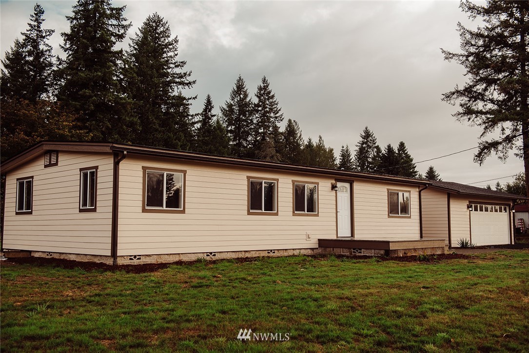 116 Eadon Road Toledo, WA 98591 - Photo 32 of 34 a view of a backyard with a garden