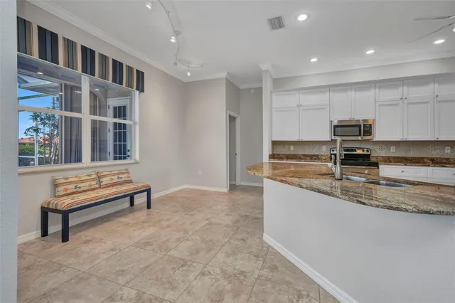 a living room with furniture and a couch