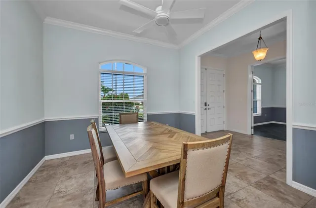 an empty room with windows and entrance