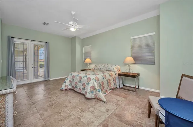 a spacious bathroom with a tub sink and mirror