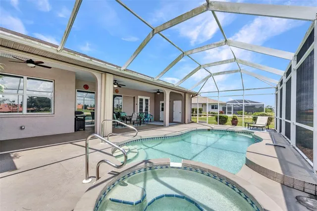 a kitchen with stainless steel appliances granite countertop a stove top oven a sink and dishwasher
