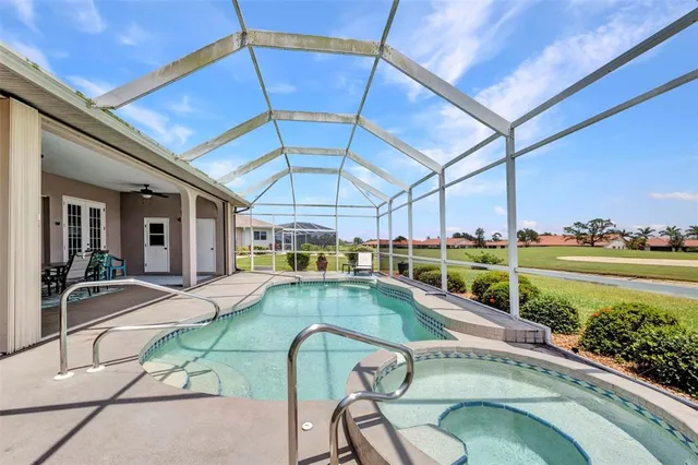 a view of a lake with a yard