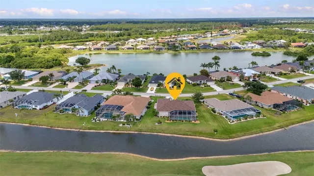 $570,000 | 12951 Southwest Kingsway Circle, Lake Suzy, FL 34269
