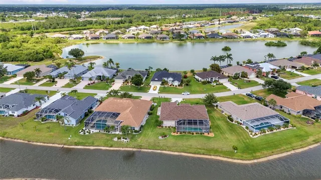 $570,000 | 12951 Southwest Kingsway Circle, Lake Suzy, FL 34269