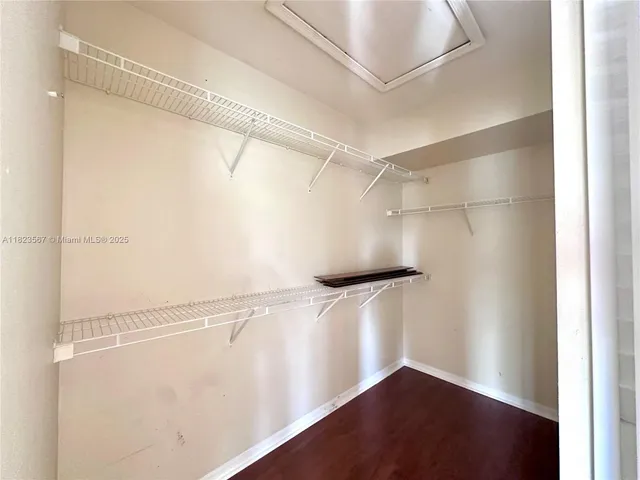 a view of an empty walk in closet