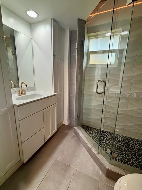 620 West Osceola Street, Unit 106 Clermont, FL 34711 - Photo 11 of 17 a bathroom with a shower and a sink