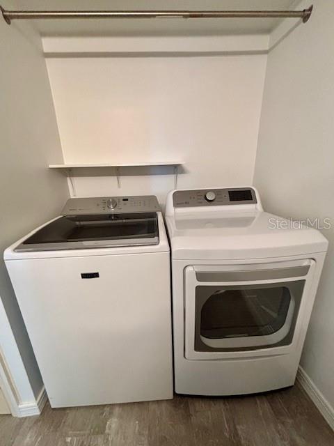 620 West Osceola Street, Unit 106 Clermont, FL 34711 - Photo 16 of 17 a utility room with dryer and washer