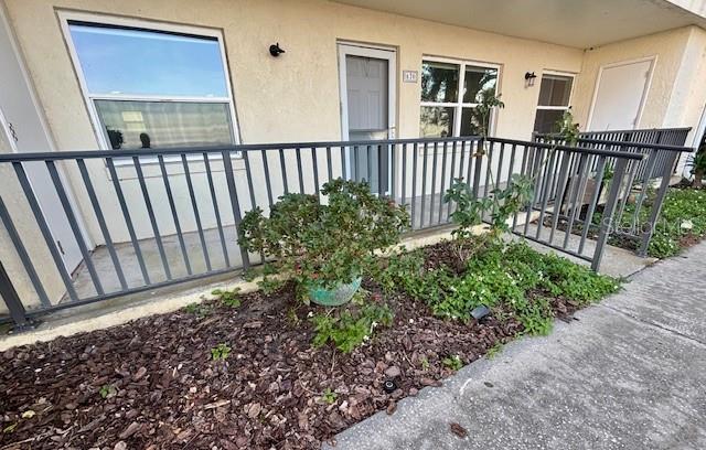 620 West Osceola Street, Unit 106 Clermont, FL 34711 - Photo 3 of 17 a view of a backyard