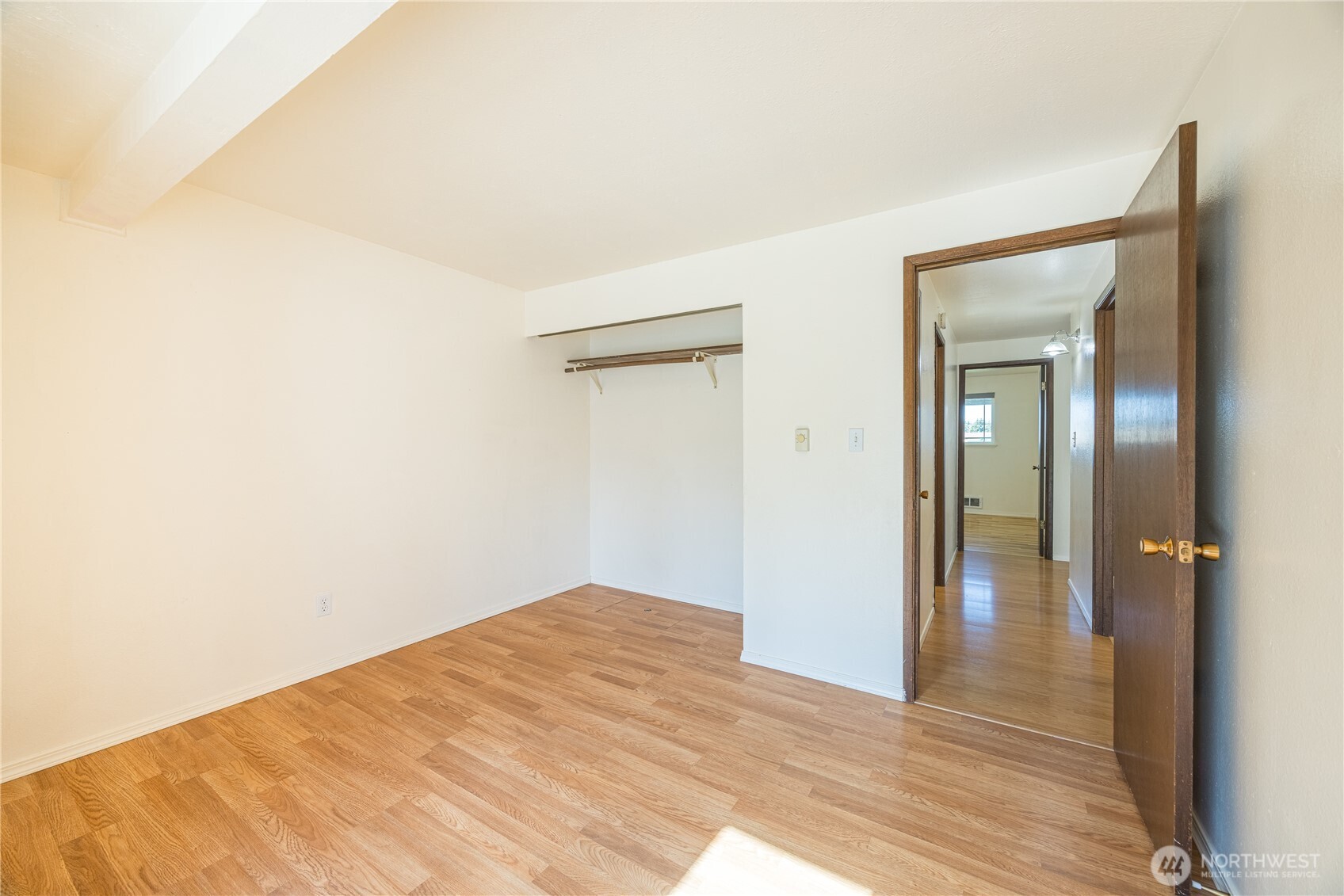 323 West Fir Street Sequim, WA 98382 - Photo 19 of 40 a view of a big room with wooden floor and closet