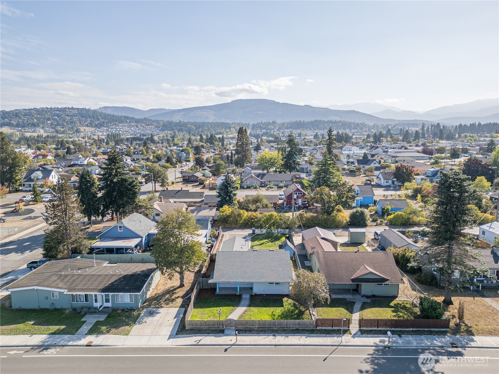 323 West Fir Street Sequim, WA 98382 - Photo 30 of 40 an aerial view of residential houses with yard
