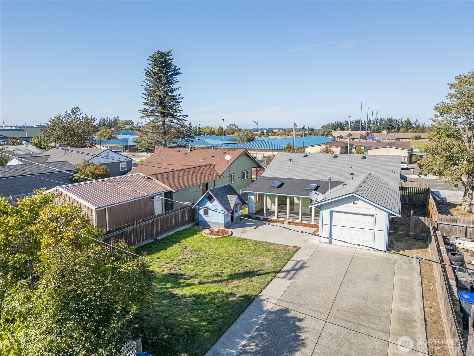 323 West Fir Street Sequim, WA 98382 - Photo 39 of 40 an aerial view of a house with garden space and street view